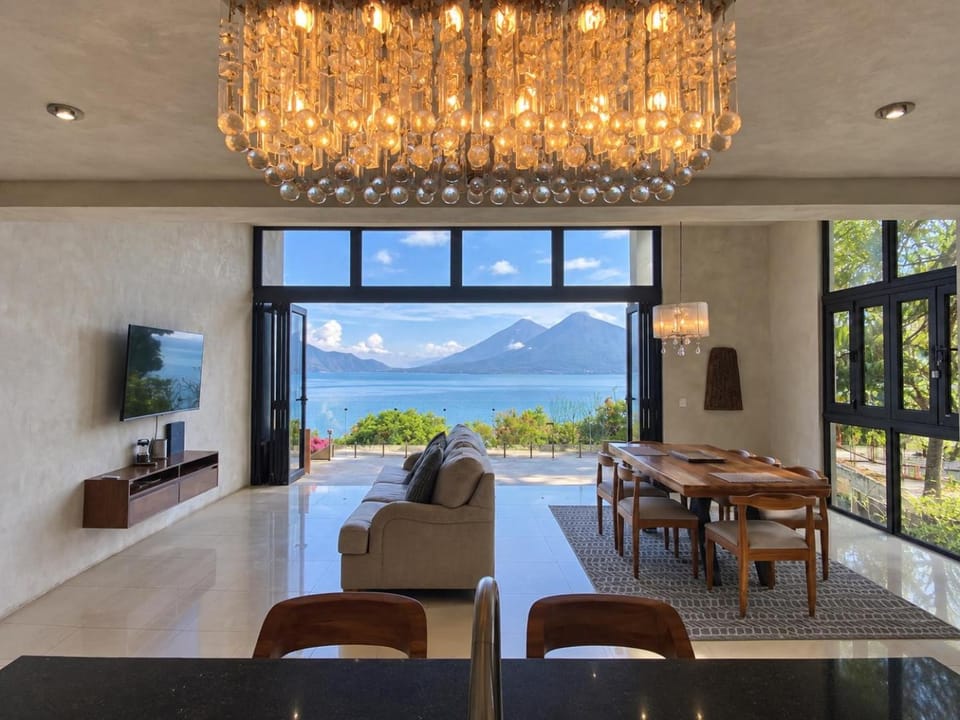 Natural landscape, Living room, Seating area, Dining area, Lake view