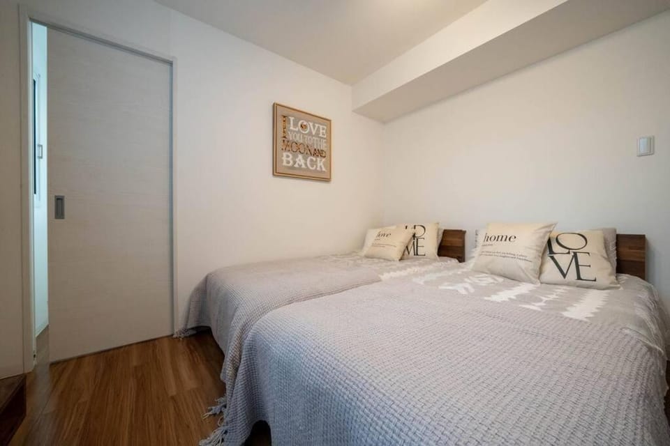 Ferien 2LDK マスターベッドルーム・駐車場付 Apartment in Sapporo