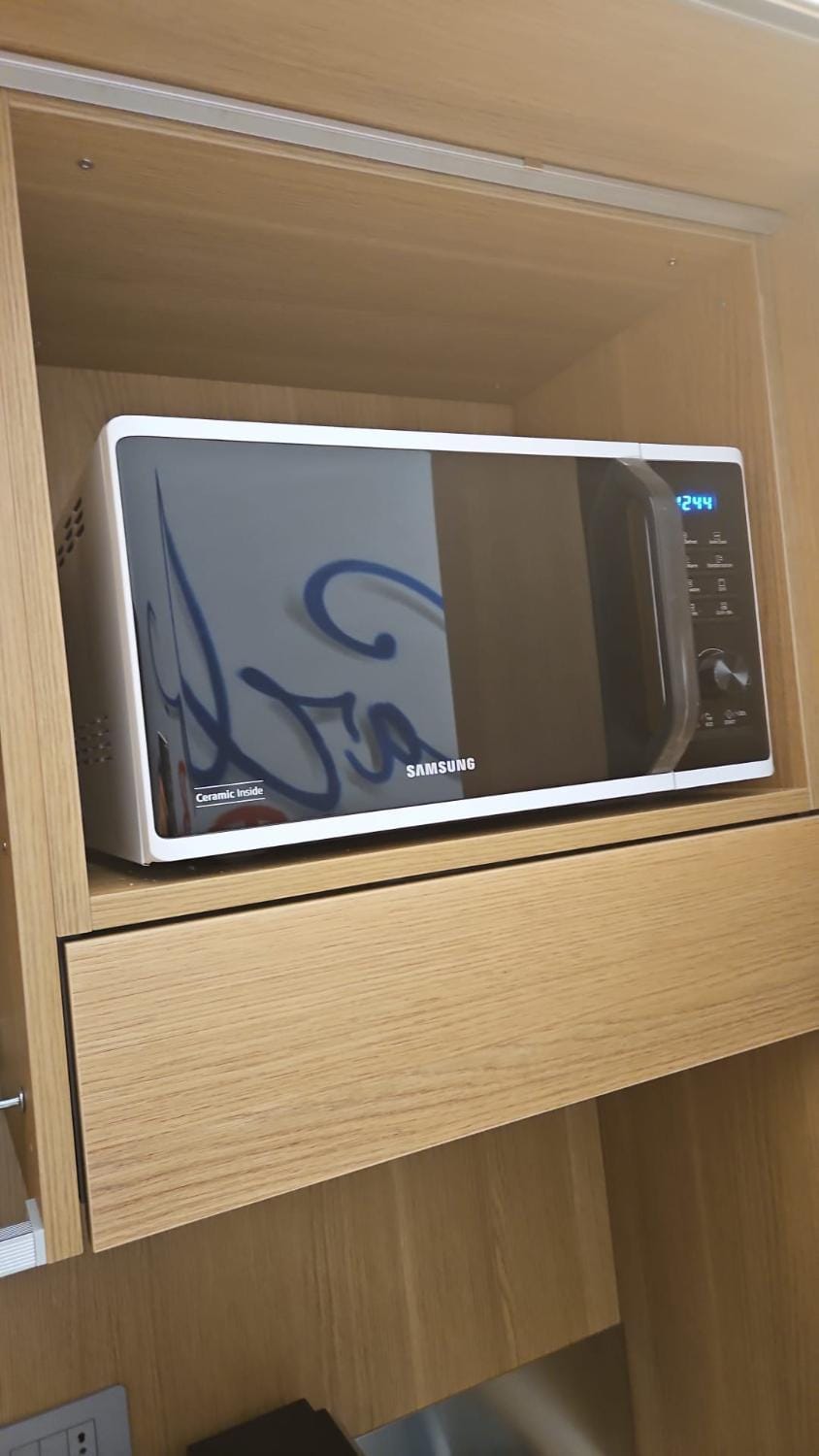 Kitchen or kitchenette, microwave, oven