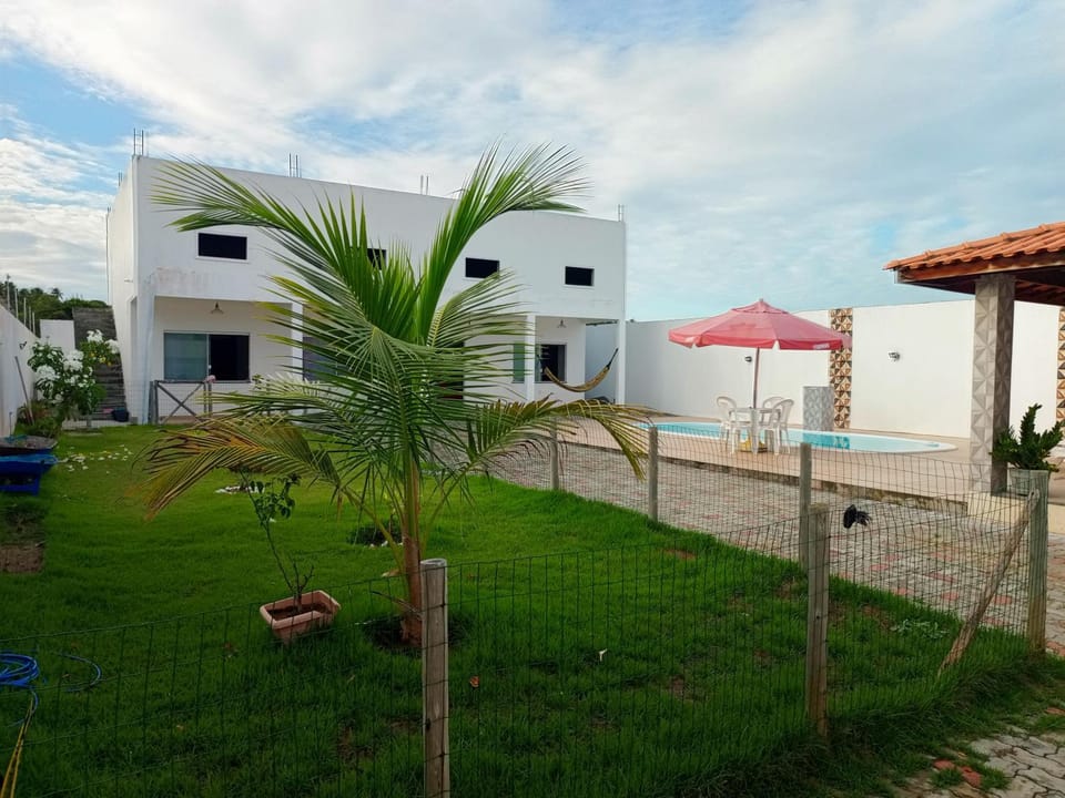 Casa aconchegante, com piscina em Barra de Jacuipe House in State of Bahia