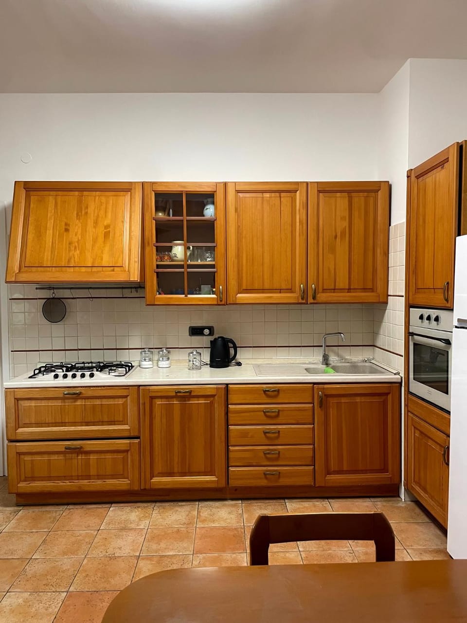 Kitchen or kitchenette, dishwasher, oven, stove
