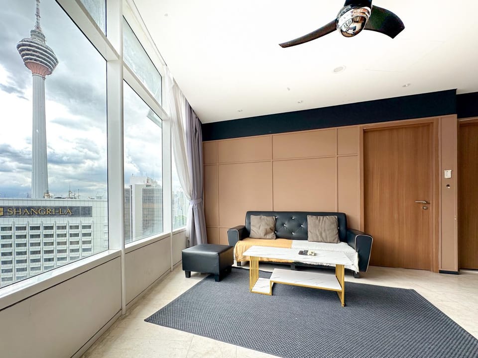 View (from property/room), Living room, Seating area, City view, Landmark view