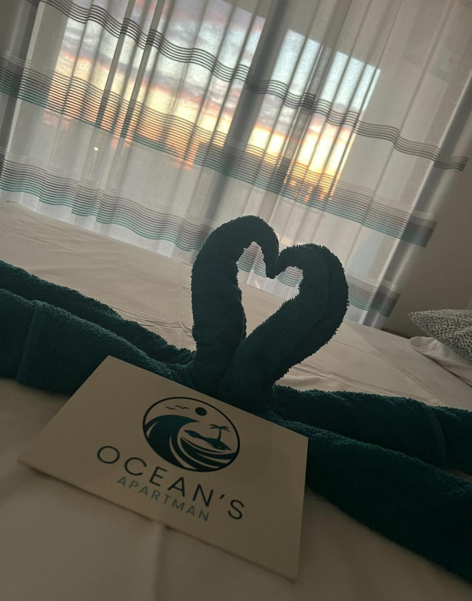 Bed, Property logo or sign, Bedroom