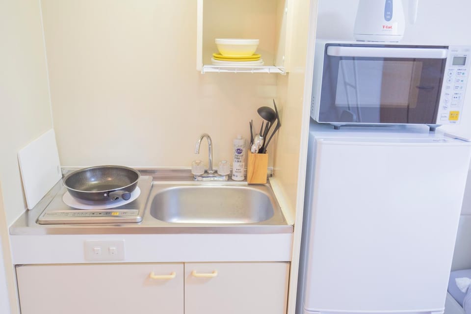 閑静な住宅街_暖かく居心地の良いデザイン EoW-7 Apartment in Shinjuku