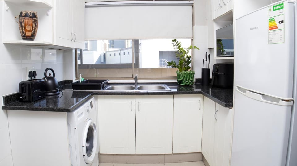Kitchen or kitchenette, oven, stove