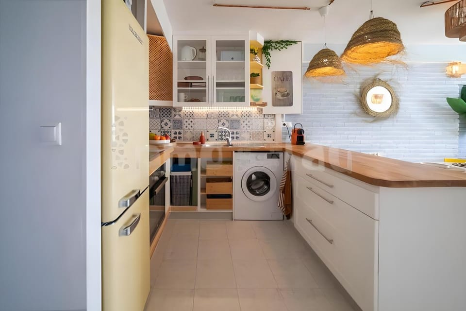 Kitchen or kitchenette, oven, stove, washing machine