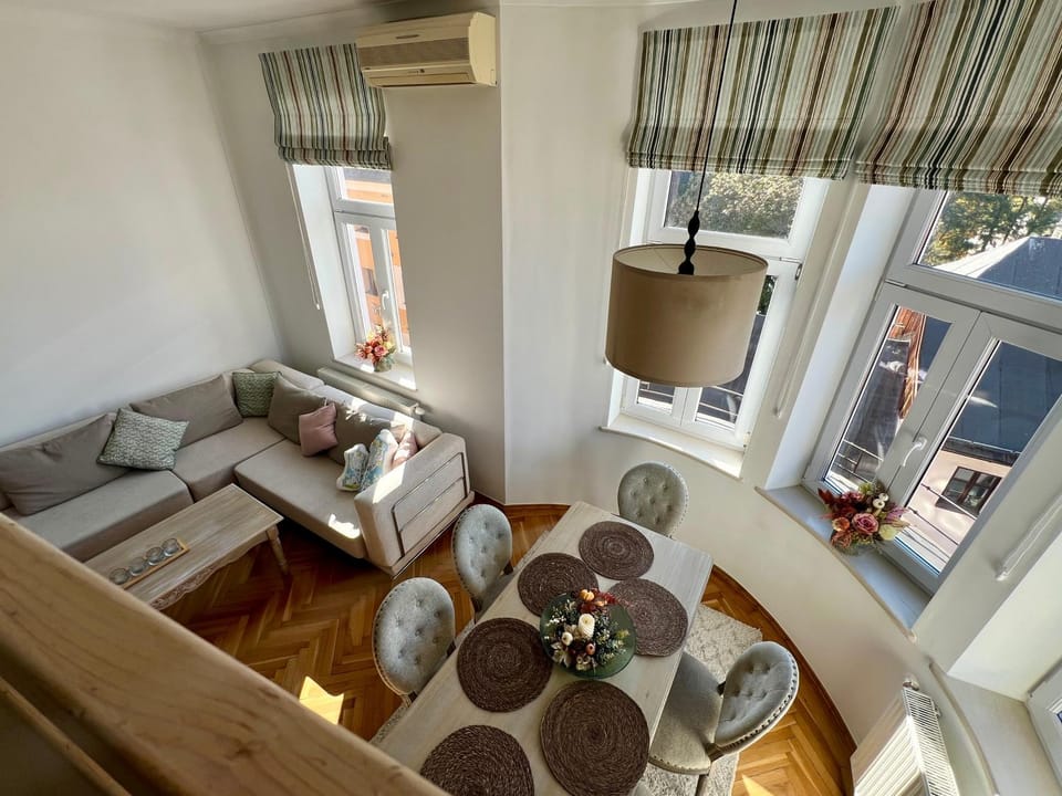 View (from property/room), Living room, Seating area, Dining area, air conditioner