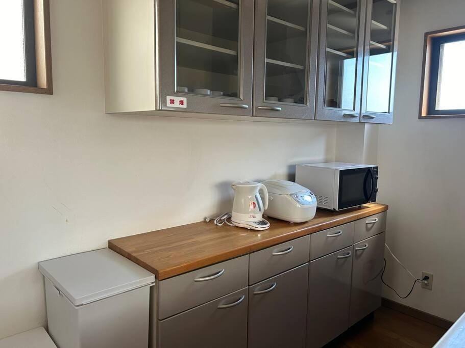 Kitchen or kitchenette, microwave