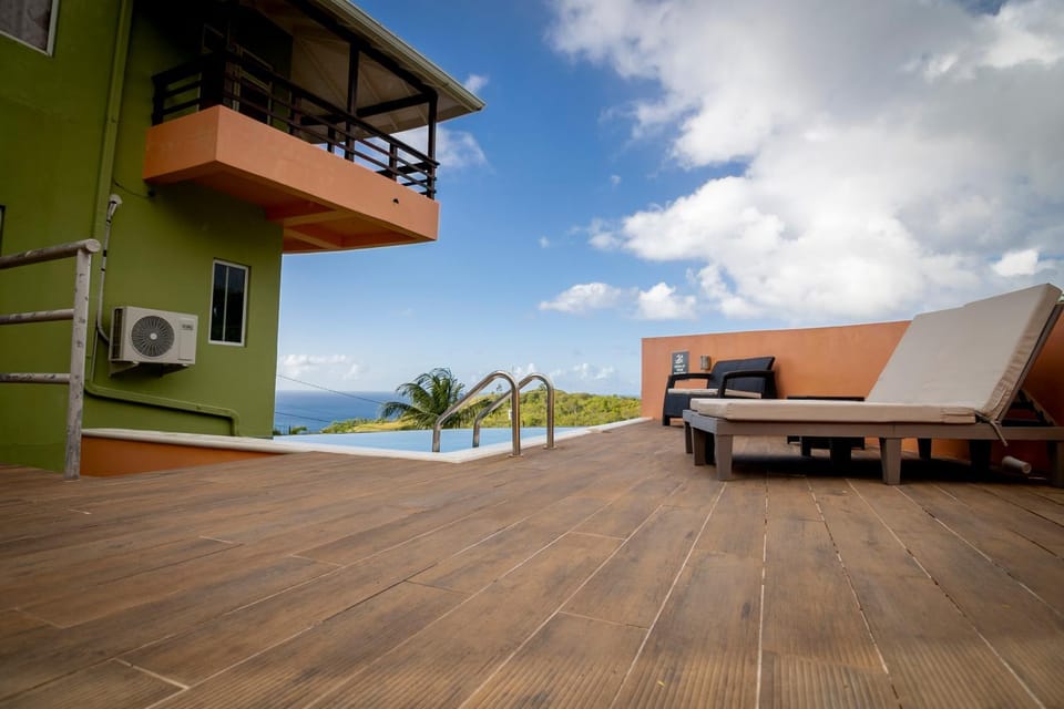 Property building, Patio, Day, Natural landscape, View (from property/room), Balcony/Terrace, Evening entertainment, Pool view, Sea view, Swimming pool