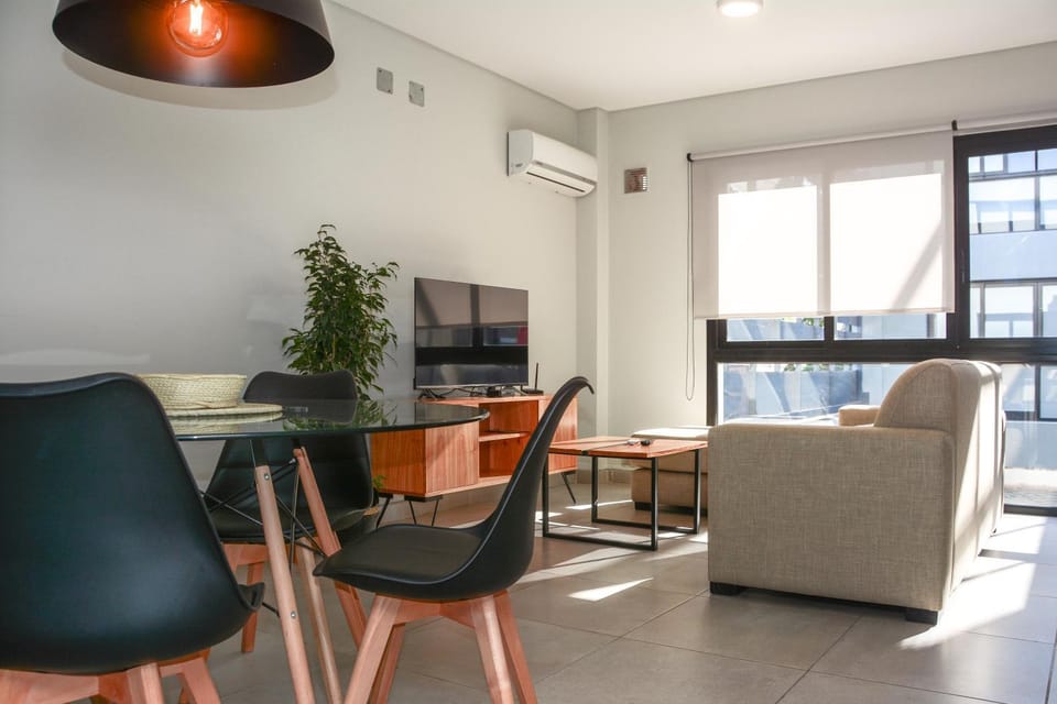 Communal lounge/ TV room, TV and multimedia, Living room, Seating area, Dining area, air conditioner