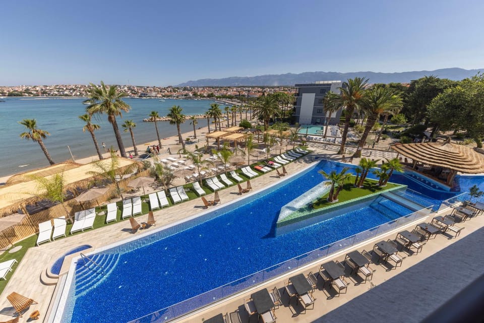 Property building, Beach, Beach, City view, Swimming pool