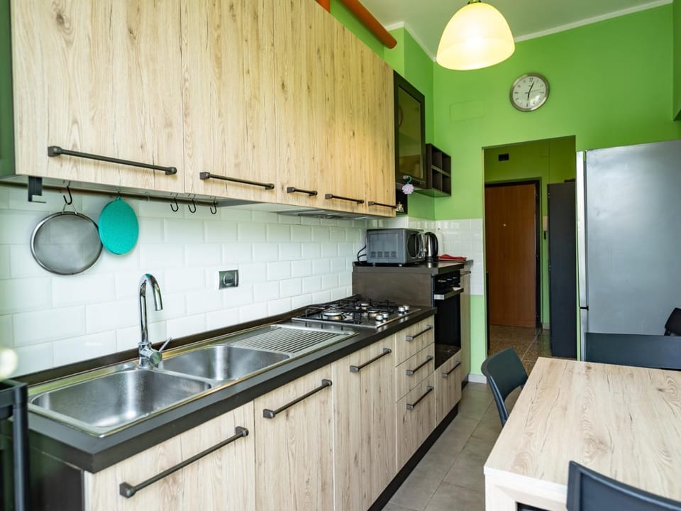 Kitchen or kitchenette, dishwasher, oven, stove