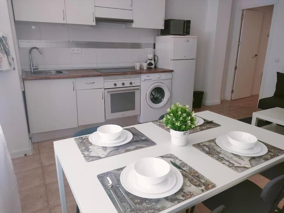 Kitchen or kitchenette, Dining area, oven, stove, toaster, washing machine