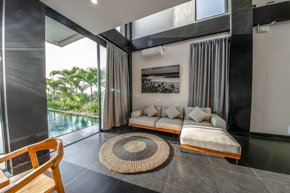 Living room, Seating area, Pool view, air conditioner