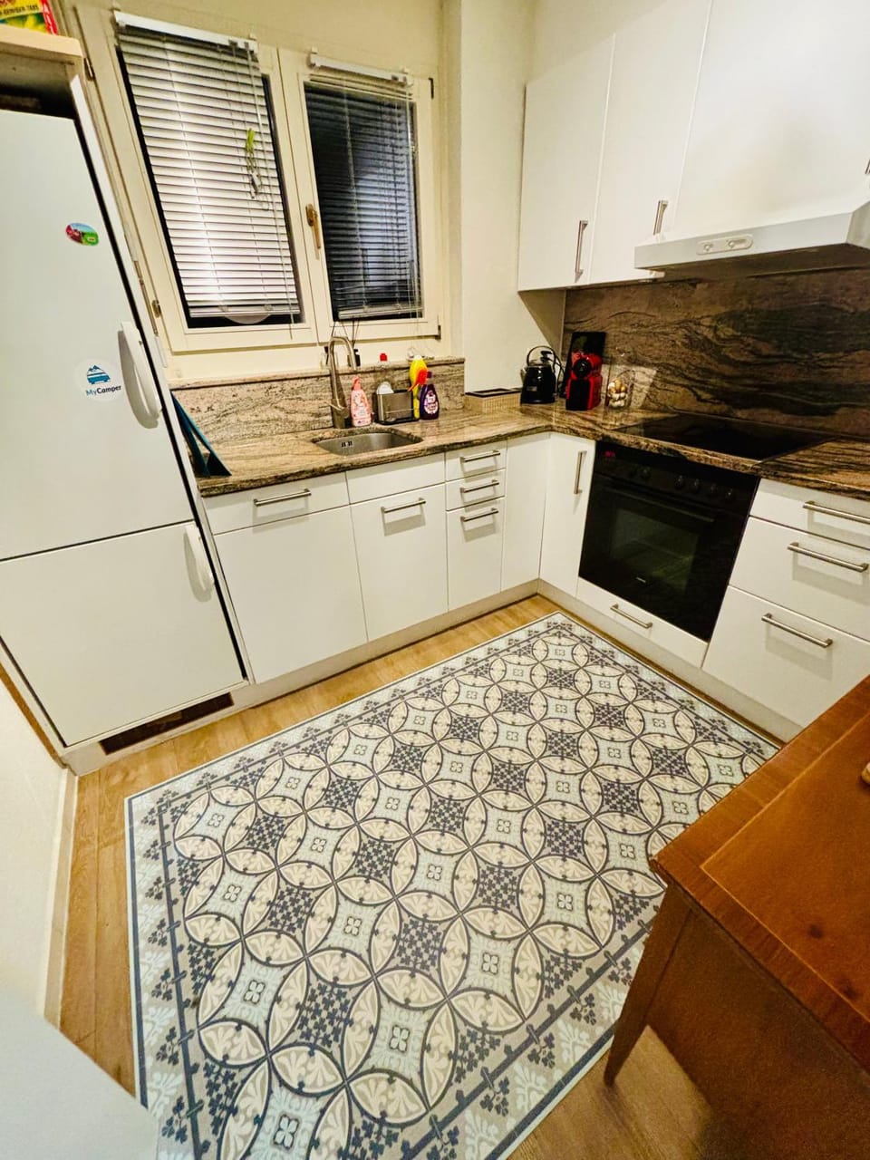 Kitchen or kitchenette, dishwasher, oven, stove