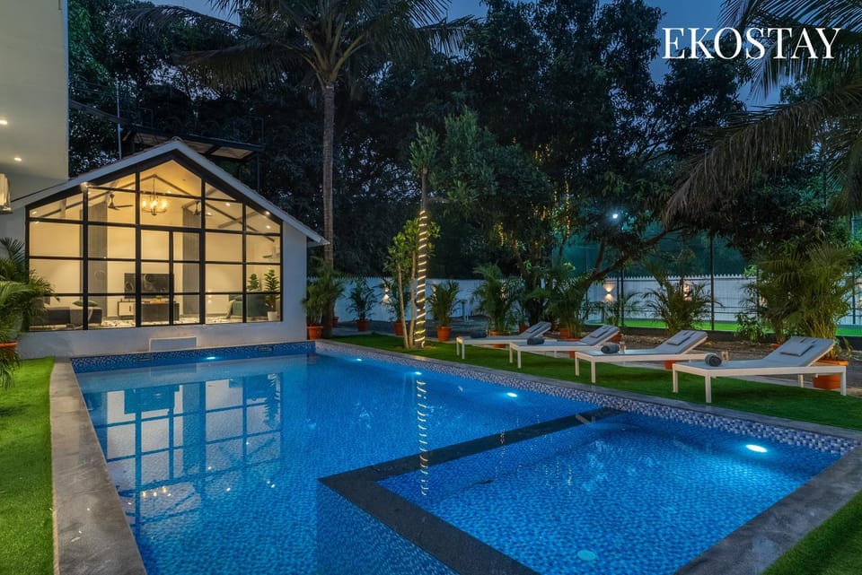 Property building, Text overlay, Pool view, Swimming pool, sunbed