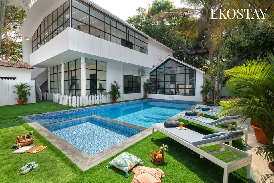 Property building, Patio, Spring, Day, Garden, Text overlay, Garden view, Pool view, Swimming pool, sunbed