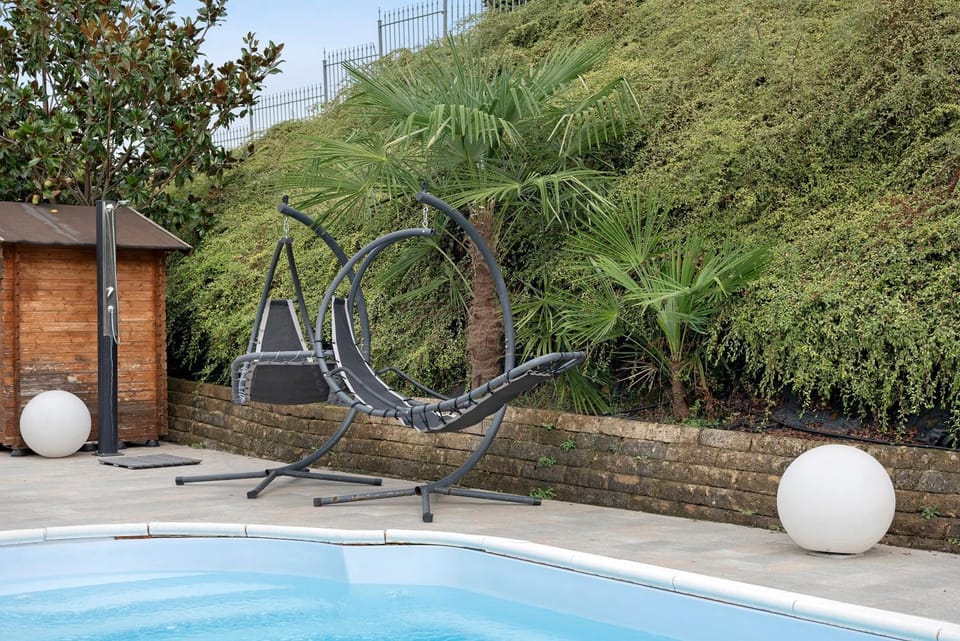 Property building, Living room, Swimming pool