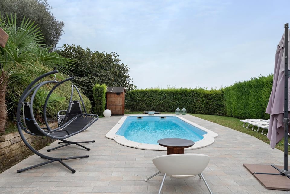 Property building, Living room, Swimming pool