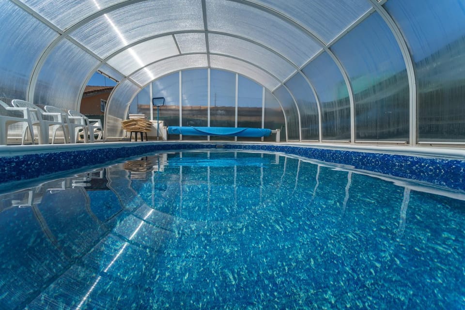 Property building, Living room, Swimming pool