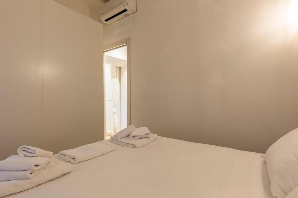 Bed, Photo of the whole room, Bedroom, towels, air conditioner
