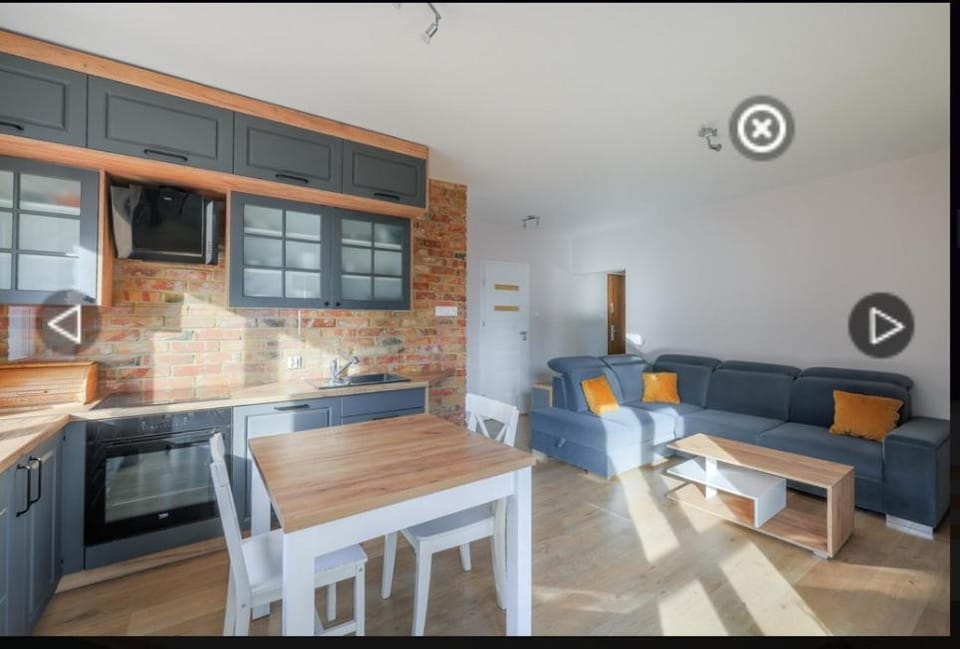 TV and multimedia, Kitchen or kitchenette, Living room, Seating area, Dining area