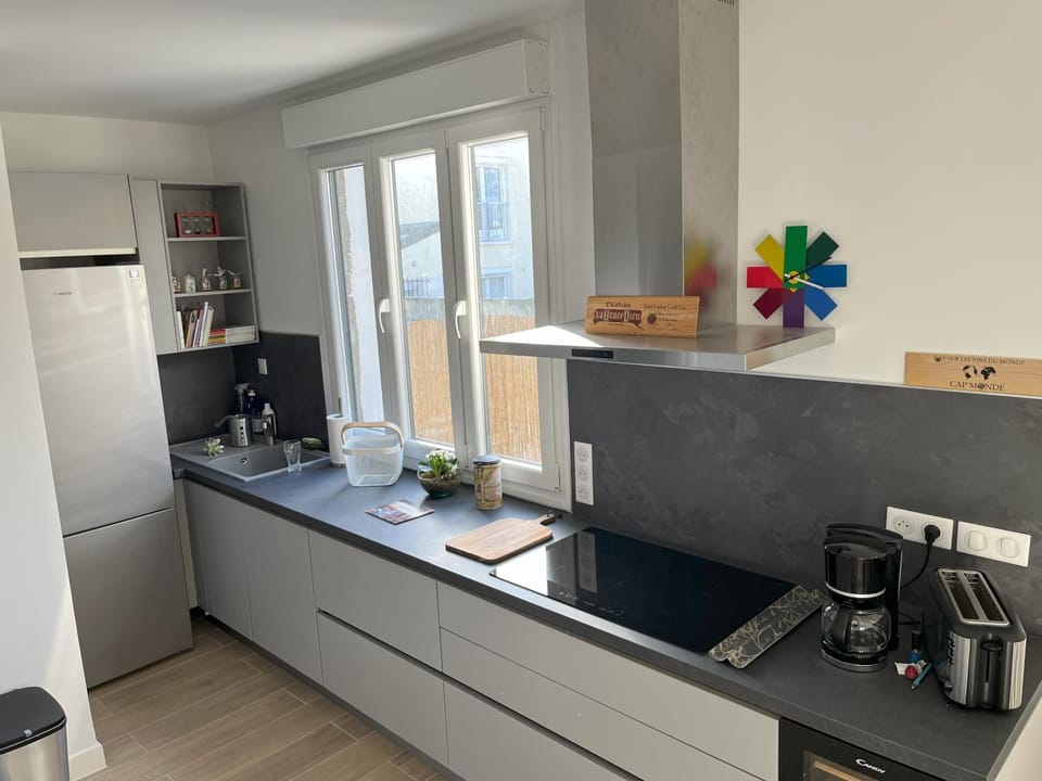 Kitchen or kitchenette, stove, toaster