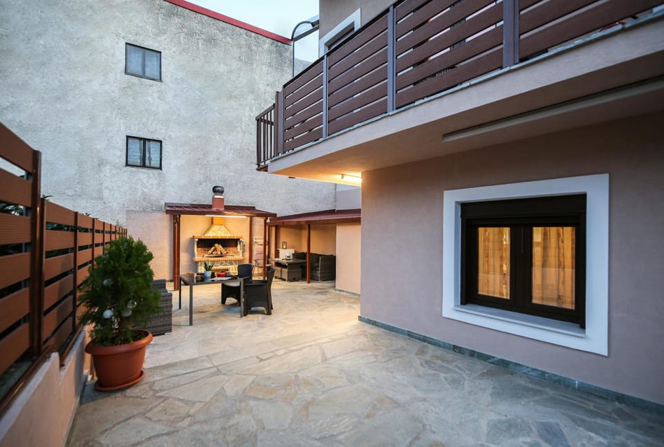 Property building, BBQ facilities, Inner courtyard view
