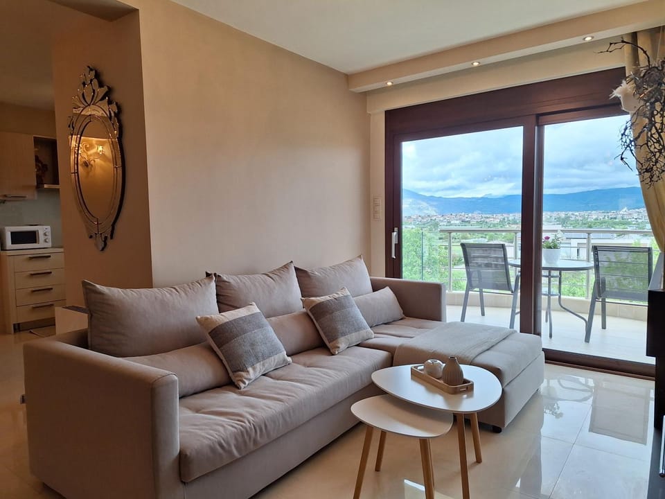 Natural landscape, View (from property/room), Balcony/Terrace, Living room, Seating area, Mountain view