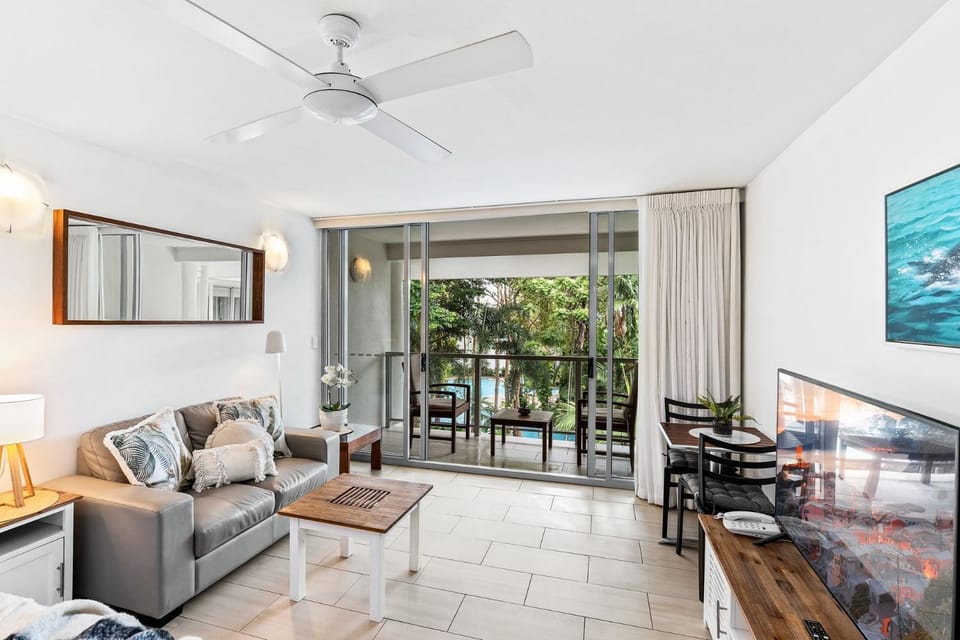 Patio, Living room, Seating area, fireplace