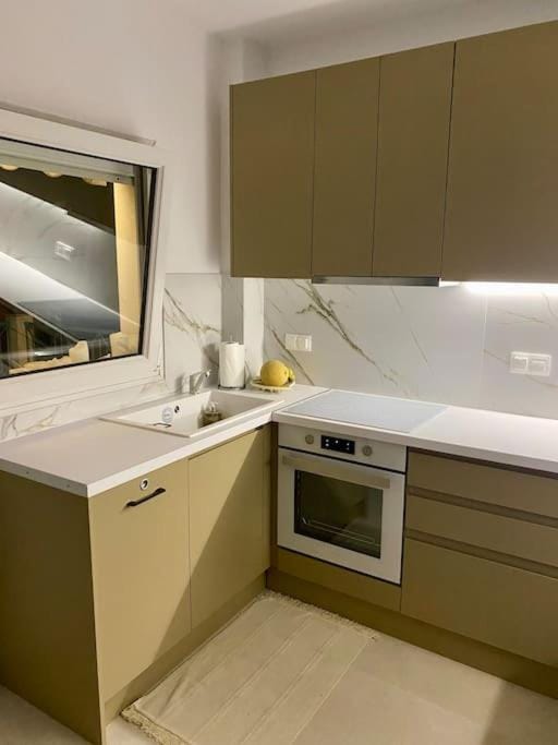 Kitchen or kitchenette, stove