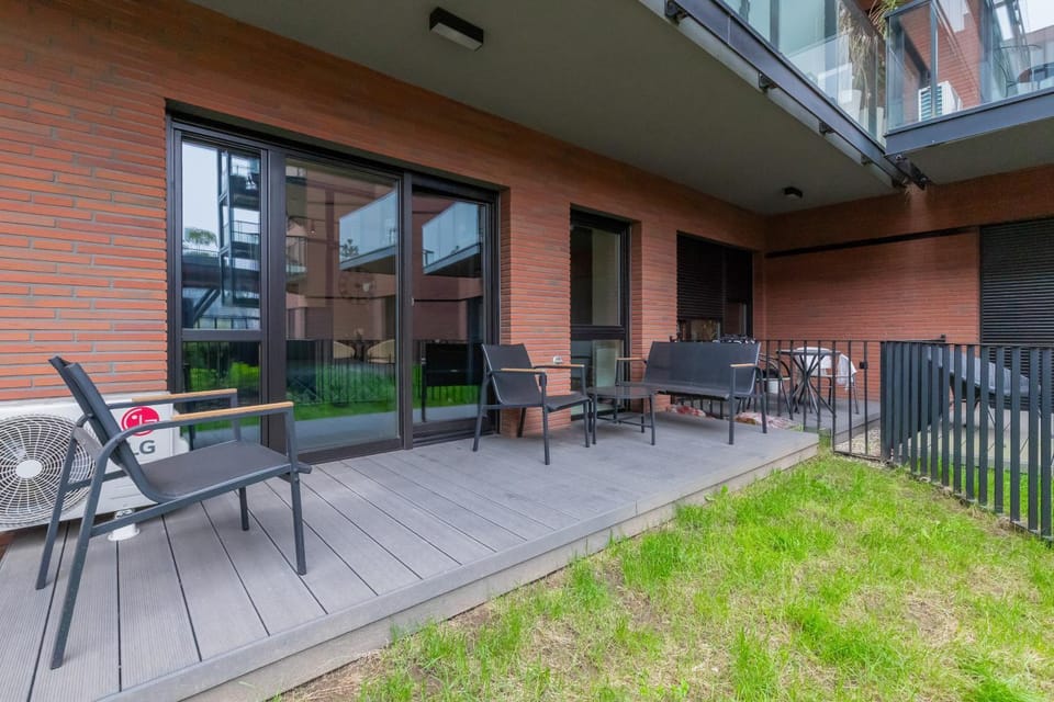 Property building, Patio, Spring, Day, Garden, View (from property/room), Balcony/Terrace, Seating area