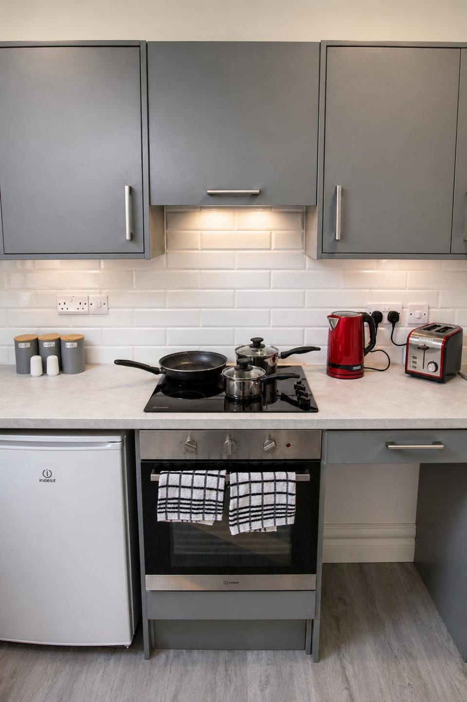 Kitchen or kitchenette, stove, toaster