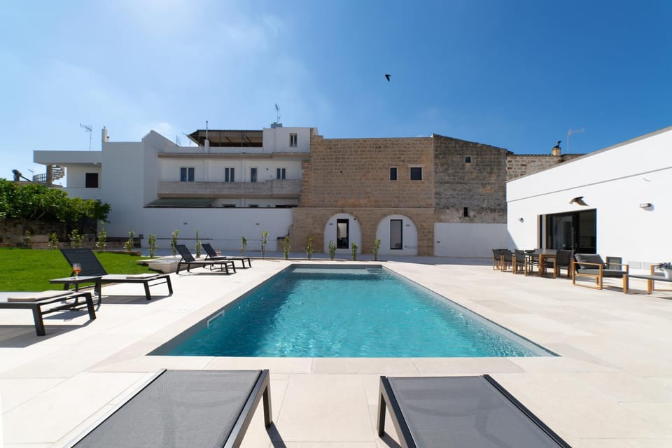 Property building, Patio, Pool view, sunbed