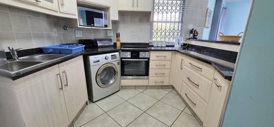 microwave, stove, washing machine, kitchen