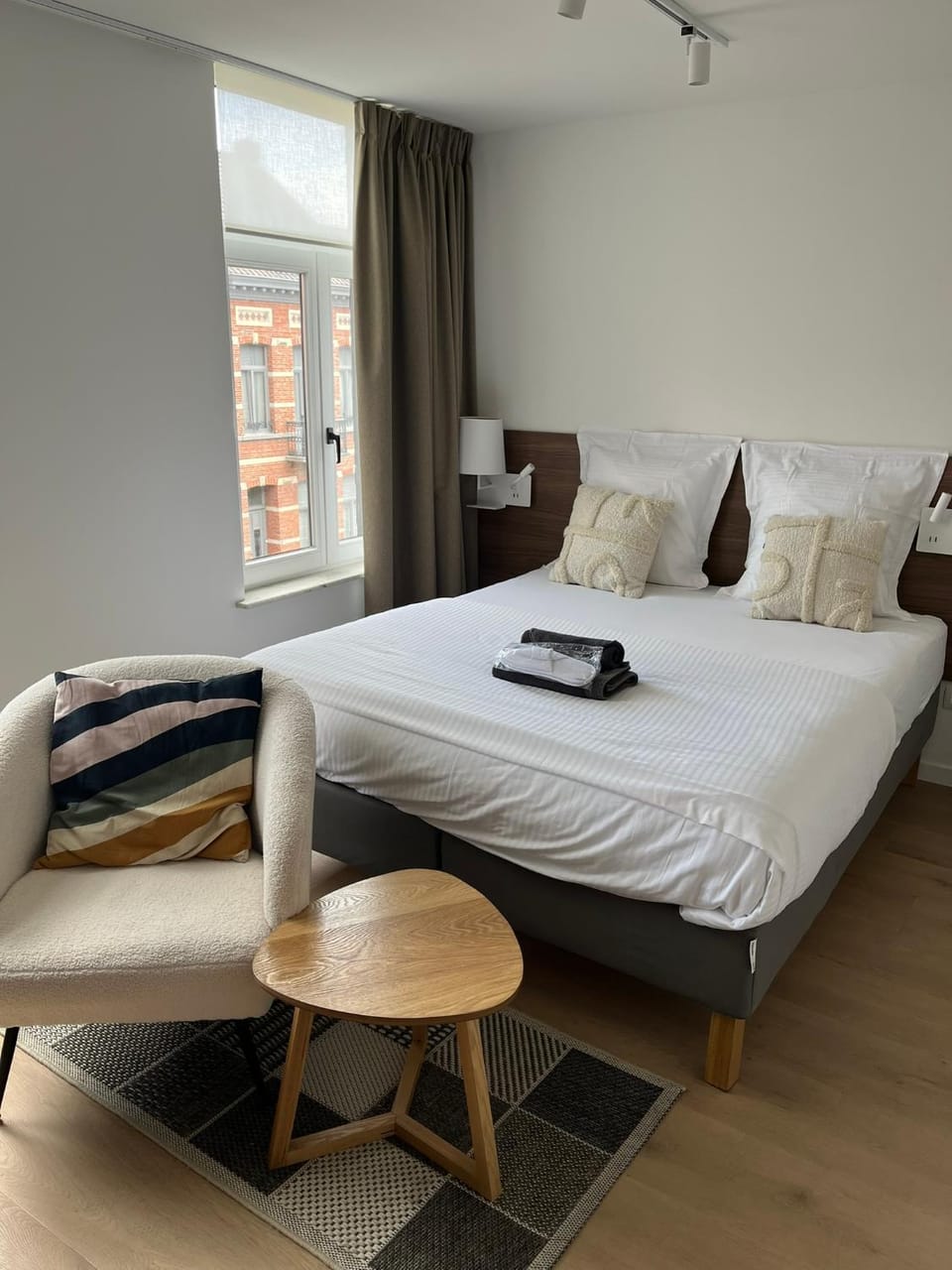 Bed, Living room, Seating area, Bedroom