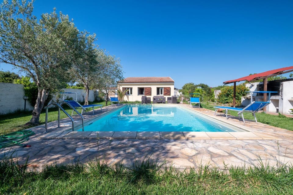 Property building, Living room, Swimming pool