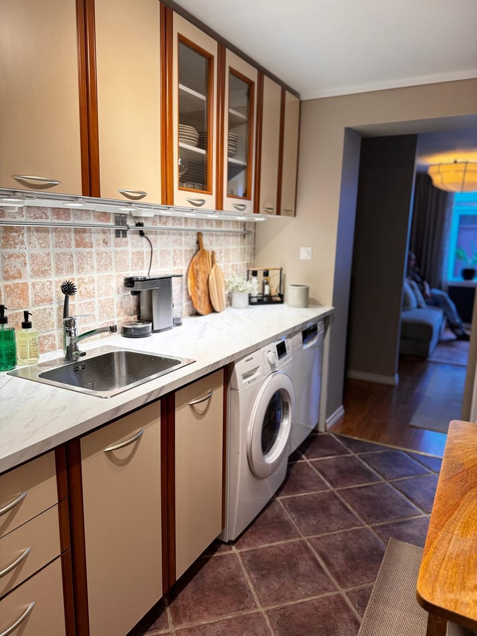 Kitchen or kitchenette, dishwasher, oven, stove, washing machine, dryer
