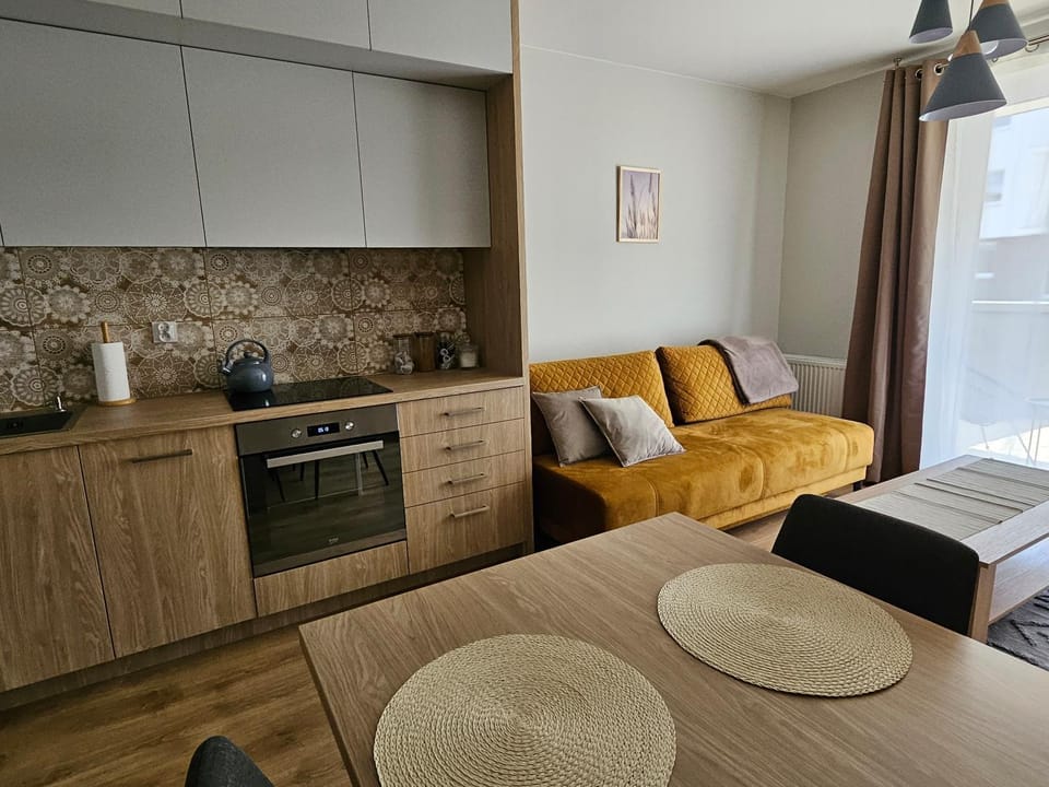 Kitchen or kitchenette, Living room, Photo of the whole room, Seating area, Dining area, stove