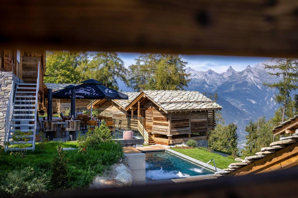 Property building, Nearby landmark, Natural landscape, Mountain view, Pool view, Swimming pool
