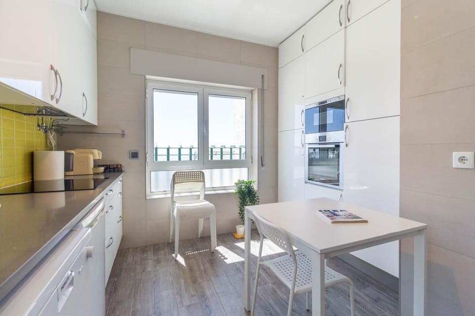 Kitchen or kitchenette, dishwasher, oven, stove