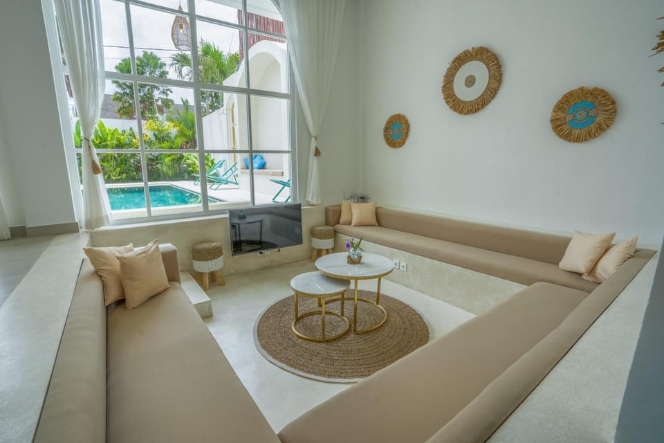Living room, Seating area, Pool view