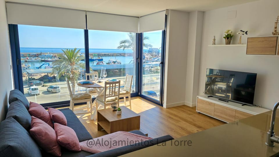 TV and multimedia, View (from property/room), Living room, Seating area, Dining area, Evening entertainment, Landmark view, Sea view