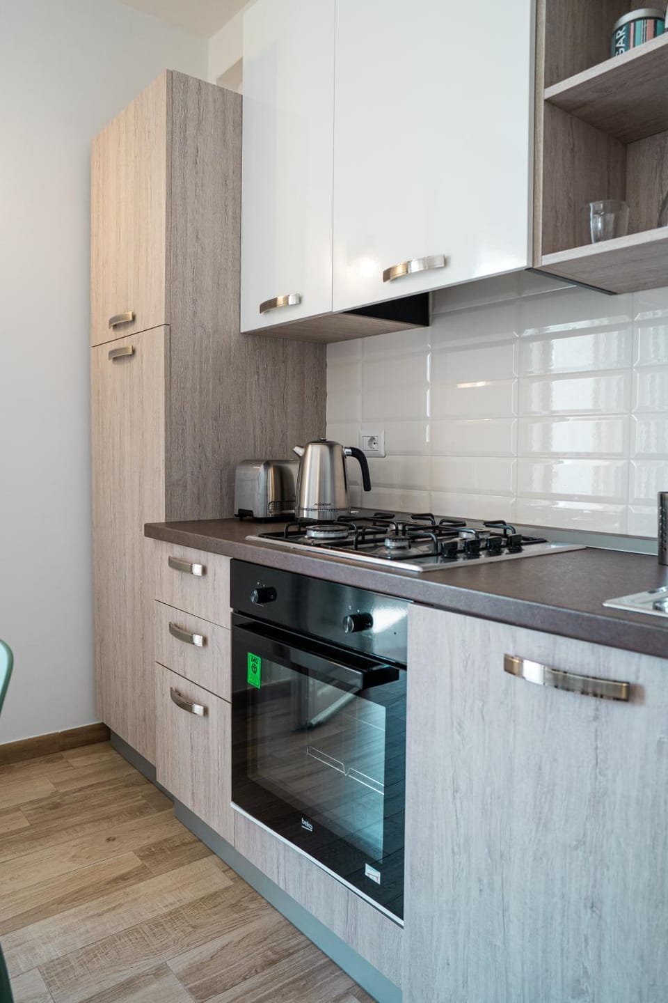 Kitchen or kitchenette, stove, toaster