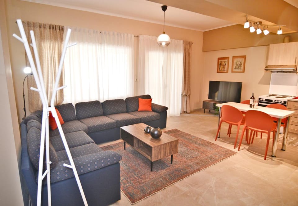TV and multimedia, Balcony/Terrace, Balcony/Terrace, Kitchen or kitchenette, Living room, Photo of the whole room, Seating area, Dining area, kitchen, air conditioner