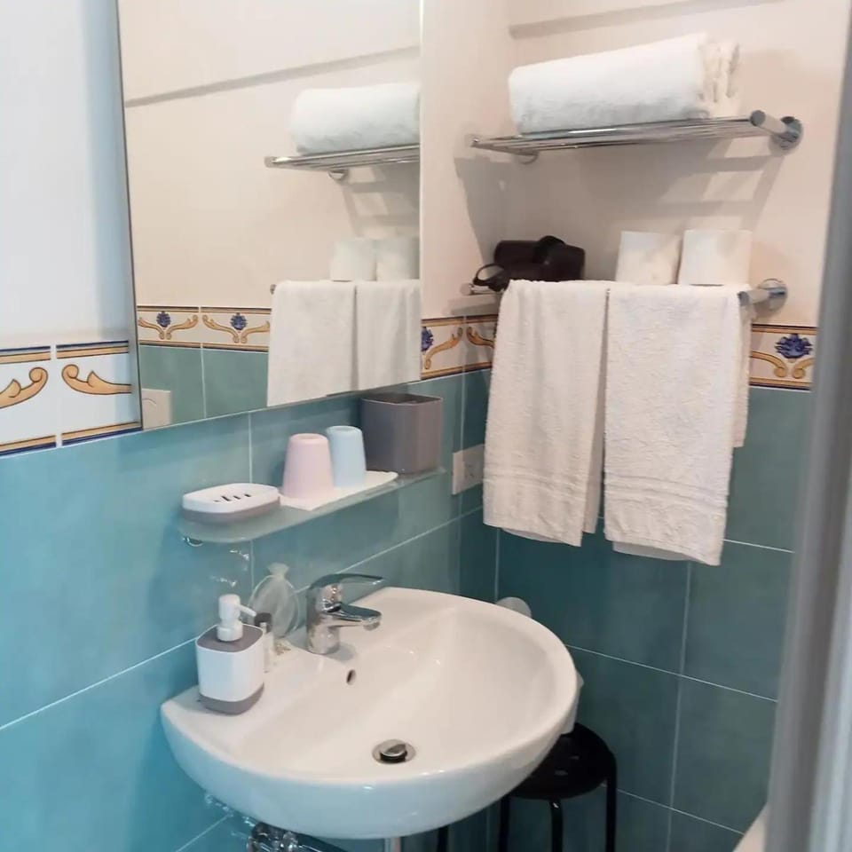 Bathroom, hair dryier, towels