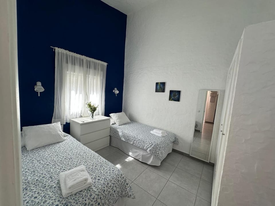 Bed, Photo of the whole room, Bedroom, flat iron, towels, wardrobe