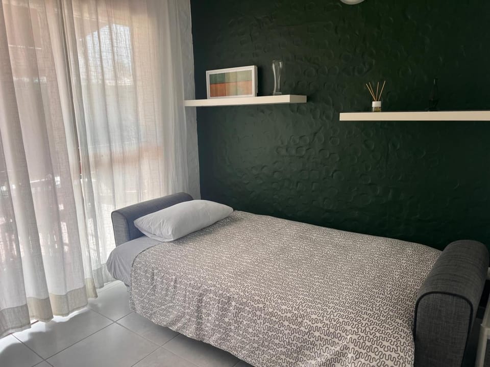 Bed, TV and multimedia, Living room, Garden view, air conditioner