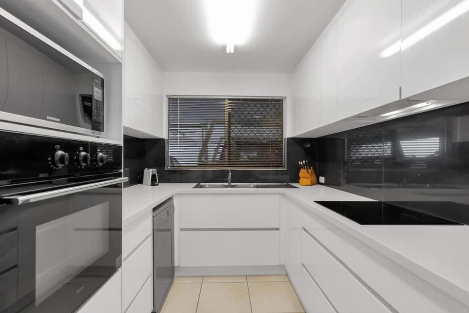 'Eclipse' A Poolside Family Escape in the CBD Apartment in Cairns