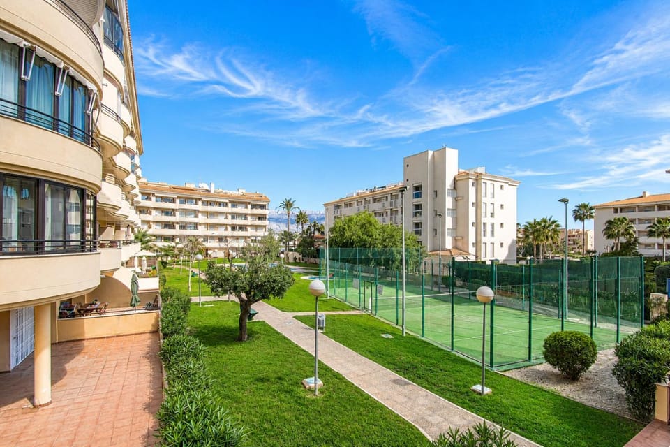 Property building, Tennis court, Garden view